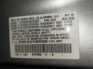 2012 Honda Odyssey LX with VIN 5FNRL5H27CB092988, listed as a IAAI auction lot 41933507 with 123,233 mi miles and . Bid and sale history available at DreamBid. Image 9.