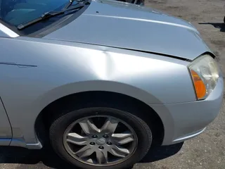 2006 Mitsubishi Galant ES with VIN 4A3AB36F66E076990, listed as a IAAI auction lot 42042081 with 231,321 mi miles. Bid and sale history available at carsss.com. Image 6.