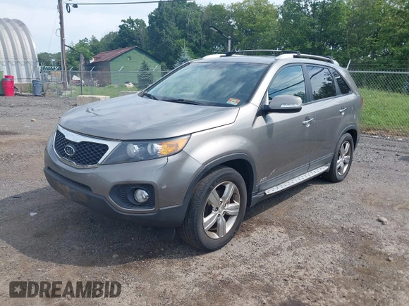 2012 Kia Sorento EX with VIN 5XYKUDA64CG255711, listed as a IAAI auction lot 42625704 with 149,625 mi miles and . Bid and sale history available at DreamBid. Image 2.