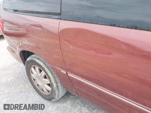 2007 Chrysler Town & Country Limited with VIN 2A8GP64L37R321508, listed as a IAAI auction lot 42058562 with 170,389 mi miles and . Bid and sale history available at DreamBid. Image 12.