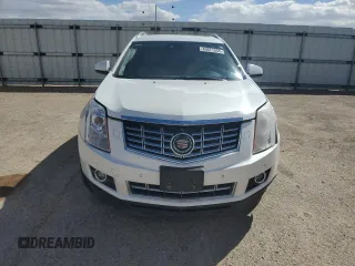 2014 Cadillac SRX Premium Collection z VIN 3GYFNGE32ES573872, wystawiony jako Copart lot #49871955 z przebiegiem 119 362 mil mil oraz Szkody całkowita. Historia ofert i sprzedaży dostępna na DreamBid. Obrazek 5.