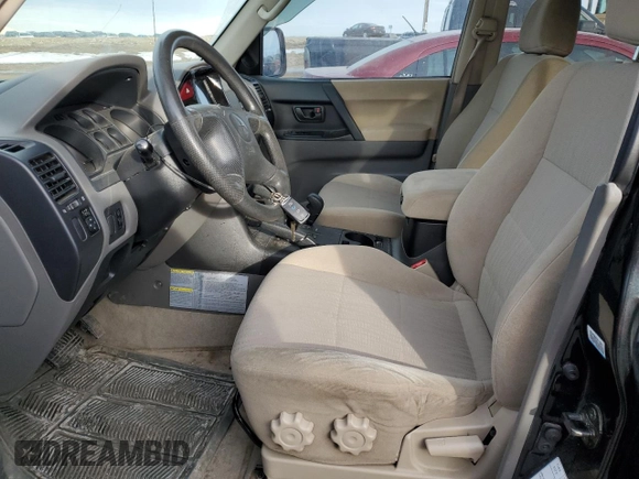 2003 Mitsubishi Montero z VIN JA4NW31SX3J600944, wystawiony jako Copart lot #87611305 z przebiegiem 215 693 mil mil oraz Czysty tytuł • Clean title. Historia ofert i sprzedaży dostępna na DreamBid. Obrazek 7.