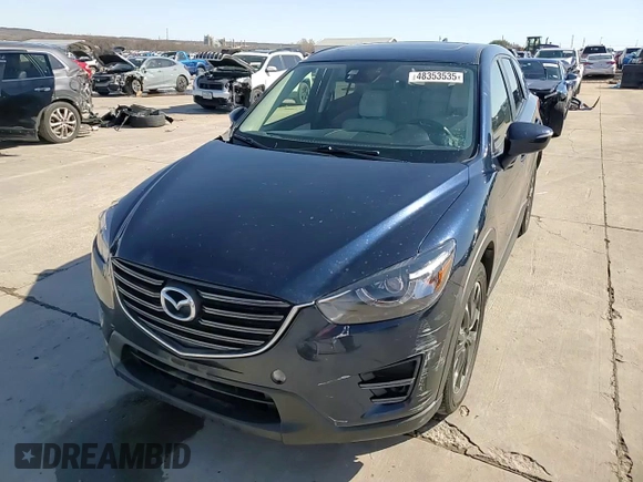 2016 Mazda CX-5 Grand Touring with VIN JM3KE2DY6G0668313, listed as a Copart auction lot 48353535 with 70,085 mi miles and Salvage Title. Bid and sale history available at carsss.com. Image 15.