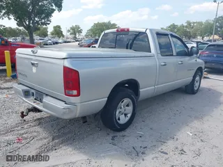 2002 Dodge Ram 1500 with VIN 3D7HA18N12G149575, listed as a IAAI auction lot 42082975 with 144,053 mi miles. Bid and sale history available at carsss.com. Image 4.