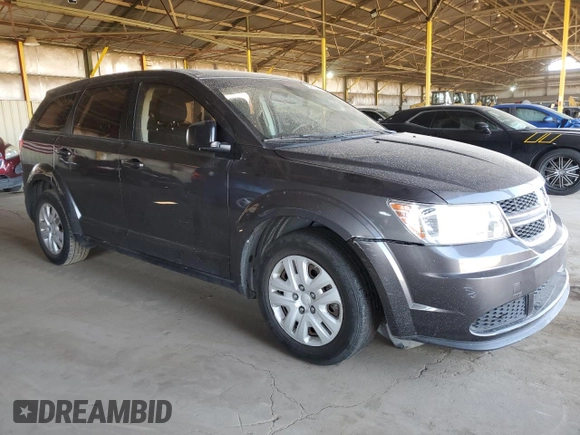 2014 Dodge Journey American Value with VIN 3C4PDCAB2ET301688, listed as a Copart auction lot 54731275 with 108,064 mi miles and Salvage Title. Bid and sale history available at DreamBid. Image 4.