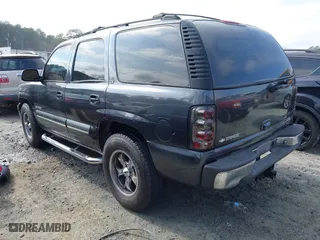 2003 Chevrolet Tahoe LS with VIN 1GNEC13ZX3R209167, listed as a IAAI auction lot 41496637 with 325,006 mi miles. Bid and sale history available at carsss.com. Image 3.