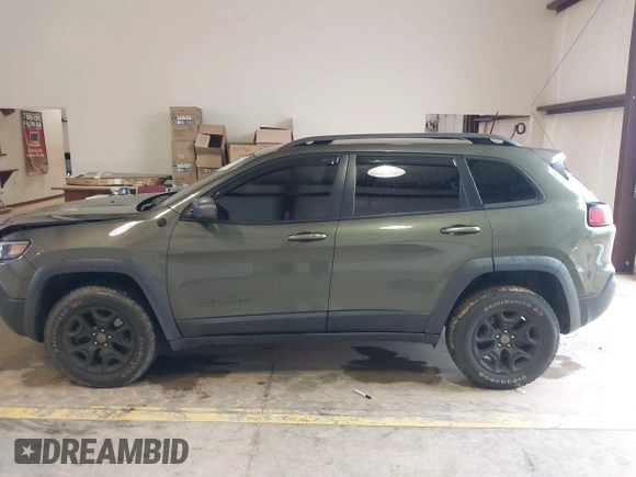 2020 Jeep Cherokee Trailhawk Elite with VIN 1C4PJMBN2LD538076, listed as a IAAI auction lot 42219282 with 53,773 mi miles and . Bid and sale history available at DreamBid. Image 14.