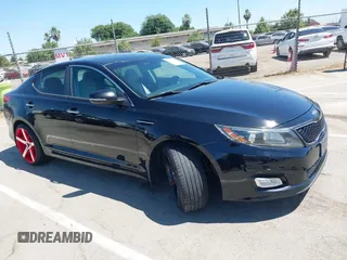 2015 Kia Optima LX z VIN 5XXGM4A76FG507580, wystawiony jako IAAI lot #42544939 z przebiegiem 99 804 mil mil oraz . Historia ofert i sprzedaży dostępna na DreamBid. Obrazek 13.