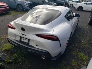 2023 Toyota GR Supra 3.0 with VIN WZ1DB0G07PW057130, listed as a Copart auction lot 79969234 with 9,512 mi miles and Salvage Title. Bid and sale history available at carsss.com. Image 3.