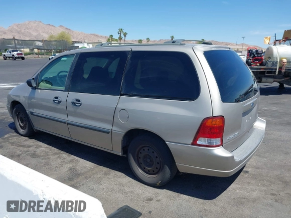 2003 Ford Windstar LX with VIN 2FMZA51493BA07188, listed as a IAAI auction lot 42096389 with 119,039 mi miles and . Bid and sale history available at carsss.com. Image 3.