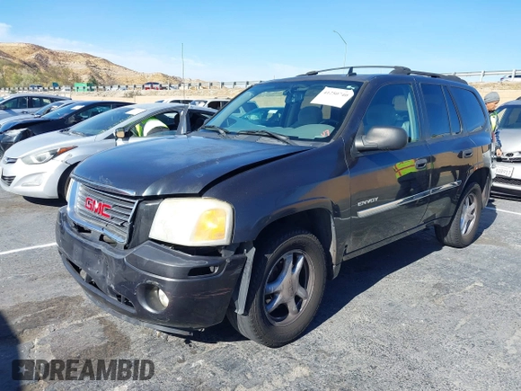 2006 GMC Envoy SLT with VIN 1GKDS13S962184712, listed as a IAAI auction lot 41250740 with 226,986 mi miles. Bid and sale history available at carsss.com. Image 2.