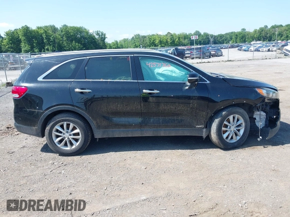 2017 Kia Sorento LX z VIN 5XYPGDA32HG265986, wystawiony jako IAAI lot #42571760 z przebiegiem 108 677 mil mil oraz . Historia ofert i sprzedaży dostępna na DreamBid. Obrazek 13.