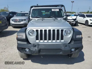 2023 Jeep Wrangler Sport with VIN 1C4HJXDG3PW670651, listed as a Copart auction lot 54013405 with 19,395 mi miles and Clean Title. Bid and sale history available at DreamBid. Image 5.