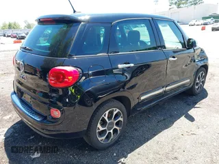 2014 FIAT 500L Lounge with VIN ZFBCFACH3EZ009820, listed as a IAAI auction lot 42294242 with 84,557 mi miles and . Bid and sale history available at DreamBid. Image 4.