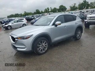 2020 Mazda CX-5 Grand Touring with VIN JM3KFADM8L0747948, listed as a Copart auction lot 59957025 with 108,899 mi miles and Salvage title. Bid and sale history available at DreamBid. Image 1.
