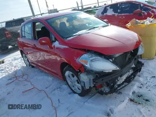 2012 Nissan Versa S with VIN 3N1BC1CP1CL361813, listed as a IAAI auction lot 41598823 with 83,026 mi miles. Bid and sale history available at carsss.com. Image 1.