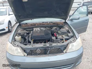 2001 Toyota Avalon XL w/Bucket Seats with VIN 4T1BF28B81U152283, listed as a IAAI auction lot 41869794 with 251,700 mi miles. Bid and sale history available at carsss.com. Image 10.