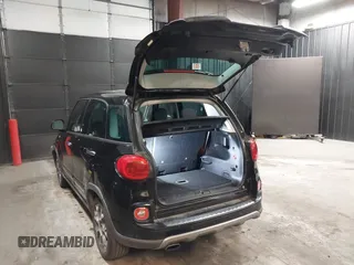 2014 FIAT 500L Trekking with VIN ZFBCFADHXEZ021414, listed as a IAAI auction lot 41596017 with 103,953 mi miles and . Bid and sale history available at DreamBid. Image 3.