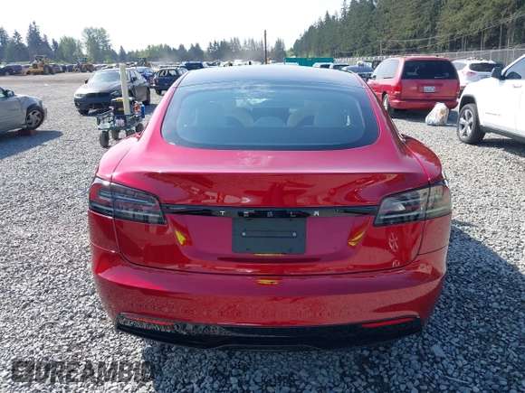2023 Tesla Model S with VIN 5YJSA1E5XPF516779, listed as a IAAI auction lot 42110737 with 16,465 mi miles and . Bid and sale history available at DreamBid. Image 17.