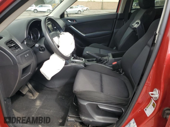 2015 Mazda CX-5 Sport with VIN JM3KE4BY9F0479748, listed as a Copart auction lot 58847805 with 122,698 mi miles and Salvage title. Bid and sale history available at DreamBid. Image 7.