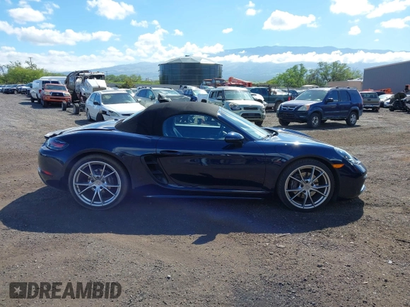 2018 Porsche 718 Boxster z VIN WP0CA2A8XJS210766, wystawiony jako IAAI lot #41617239 z przebiegiem 55 336 mil mil oraz . Historia ofert i sprzedaży dostępna na DreamBid. Obrazek 13.