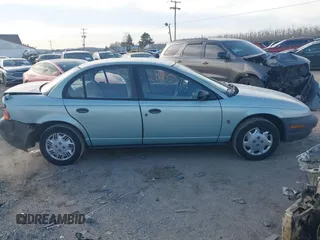 1997 Saturn SL with VIN 1G8ZH528XVZ196784, listed as a IAAI auction lot 41662187 with 112,278 mi miles. Bid and sale history available at carsss.com. Image 13.