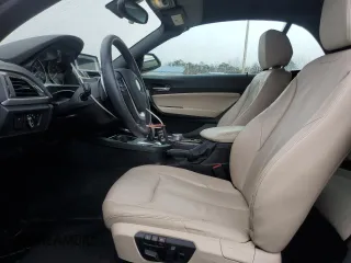 2015 BMW 2 Series 228i with VIN WBA1K5C57FV474037, listed as a Copart auction lot 87857635 with 91,333 mi miles and Salvage title. Bid and sale history available at DreamBid. Image 7.