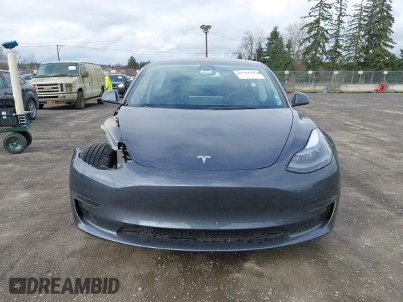 2023 Tesla Model 3 with VIN 5YJ3E1EA2PF623217, listed as a IAAI auction lot 41701413 with 21,246 mi miles and . Bid and sale history available at DreamBid. Image 13.