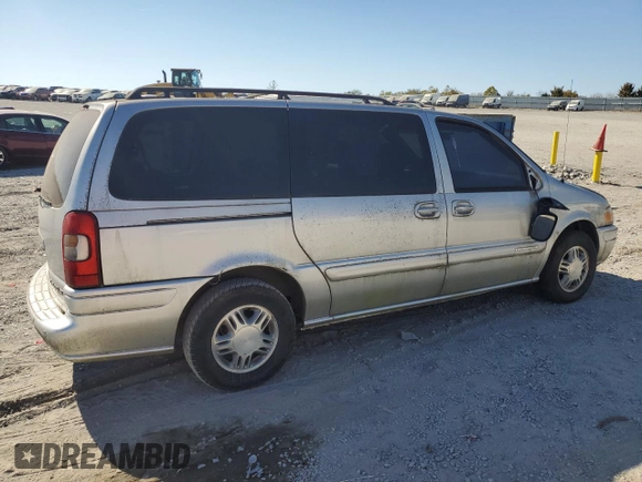 2002 Chevrolet Venture Warner Bros 1SE z VIN 1GNDX13E02D147755, wystawiony jako Copart lot #77258704 z przebiegiem 106 766 mil mil oraz Czysty tytuł • Clean title. Historia ofert i sprzedaży dostępna na DreamBid. Obrazek 3.