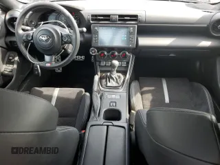 2022 Toyota 86 Premium с VIN JF1ZNBF14N8757972, выставлен на аукционе Copart как лот 57211205 с пробегом 26 204 миль миль и Списание • Salvage title. История ставок и продаж доступна на DreamBid. Изображение 8.