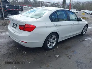 2013 BMW 3 Series 328i xDrive with VIN WBA3B5G5XDNS04574, listed as a IAAI auction lot 41935635 with 135,408 mi miles. Bid and sale history available at carsss.com. Image 4.