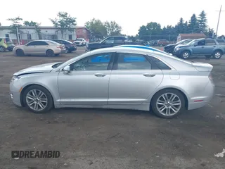 2013 Lincoln MKZ z VIN 3LN6L2G98DR803528, wystawiony jako IAAI lot #42573341 z przebiegiem 140 006 mil mil oraz . Historia ofert i sprzedaży dostępna na DreamBid. Obrazek 14.