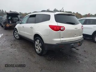 2011 Chevrolet Traverse LTZ with VIN 1GNKVLED5BJ385566, listed as a IAAI auction lot 40530314 with 166,155 mi miles and . Bid and sale history available at DreamBid. Image 3.