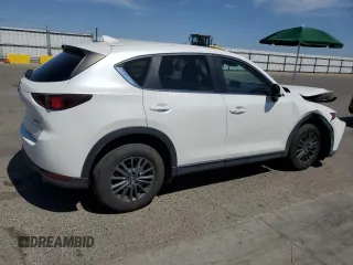 2020 Mazda CX-5 Touring z VIN JM3KFACM7L0833480, wystawiony jako Copart lot #58270225 z przebiegiem 46 061 mil mil oraz Szkoda całkowita • Salvage title. Historia ofert i sprzedaży dostępna na DreamBid. Obrazek 3.
