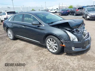 2013 Cadillac XTS Luxury z VIN 2G61P5S3XD9244824, wystawiony jako IAAI lot #42384480 z przebiegiem 78 192 mil mil oraz . Historia ofert i sprzedaży dostępna na DreamBid. Obrazek 1.