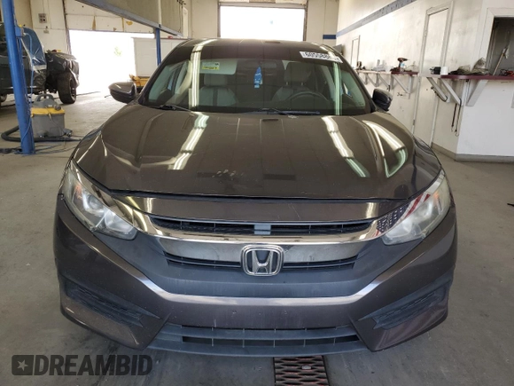 2017 Honda Civic LX with VIN 2HGFC2F5XHH539976, listed as a Copart auction lot 60558865 with 79,519 mi miles and Salvage title. Bid and sale history available at DreamBid. Image 5.
