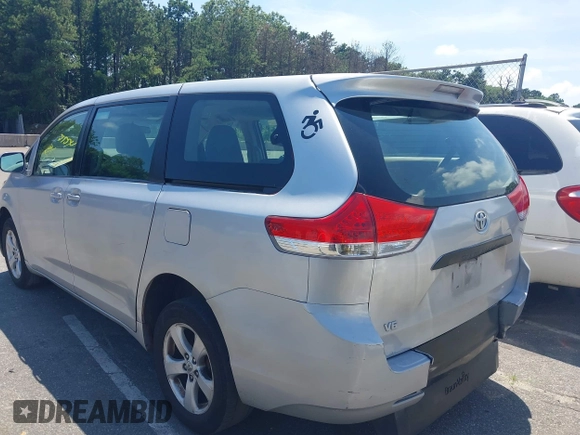 2014 Toyota Sienna L with VIN 5TDZK3DC9ES518653, listed as a IAAI auction lot 42767591 with 261,730 mi miles and . Bid and sale history available at DreamBid. Image 3.
