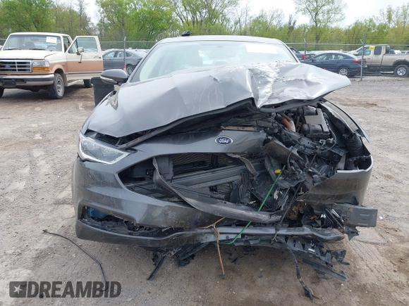 2018 Ford Fusion Titanium with VIN 3FA6P0RU1JR120392, listed as a IAAI auction lot 42145342 with Not provided miles and . Bid and sale history available at DreamBid. Image 12.