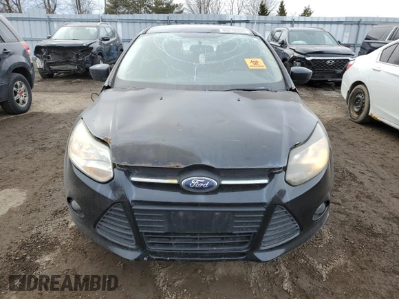 2012 Ford Focus SE with VIN 1FAHP3F24CL458433, listed as a Copart auction lot 48610995 with 283,408 mi miles and Clean Title. Bid and sale history available at DreamBid. Image 5.