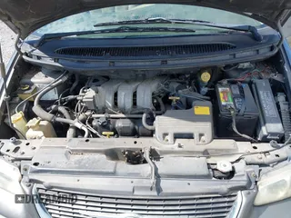 1999 Chrysler Town & Country LXi with VIN 1C4GP54LXXB553393, listed as a IAAI auction lot 41968605 with 256,400 mi miles. Bid and sale history available at carsss.com. Image 10.