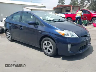 2015 Toyota Prius Four with VIN JTDKN3DU0F0460986, listed as a IAAI auction lot 42153819 with 148,479 mi miles. Bid and sale history available at carsss.com. Image 1.