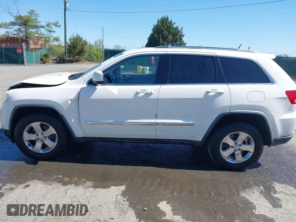 2011 Jeep Grand Cherokee Laredo with VIN 1J4RR4GG3BC736370, listed as a IAAI auction lot 42053862 with 169,269 mi miles and . Bid and sale history available at DreamBid. Image 14.