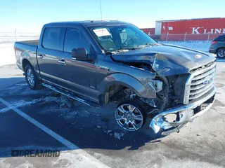 2015 Ford F-150 XLT with VIN 1FTEW1EG5FKF22006, listed as a IAAI auction lot 41637056 with 112,235 mi miles. Bid and sale history available at carsss.com. Image 1.
