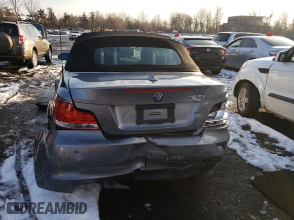 2009 BMW 1 Series 128i with VIN WBAUN13569VH80991, listed as a Copart auction lot 43225685 with 104,652 mi miles and Salvage Title. Bid and sale history available at DreamBid. Image 6.
