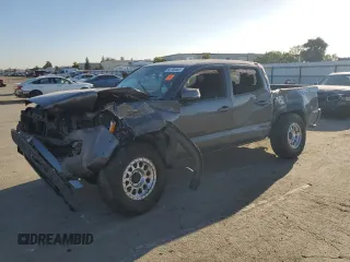 2021 Toyota Tacoma SR with VIN 3TMCZ5ANXMM448226, listed as a Copart auction lot 60700465 with Not provided miles and Salvage title. Bid and sale history available at DreamBid. Image 1.