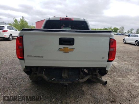 2018 Chevrolet Colorado 4WD LT with VIN 1GCPTCE15J1326817, listed as a Copart auction lot 57377435 with 143,962 mi miles and Salvage title. Bid and sale history available at DreamBid. Image 6.