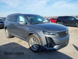 2020 Cadillac XT6 FWD Premium Luxury with VIN 1GYKPCRS8LZ129799, listed as a IAAI auction lot 41602536 with 96,865 mi miles. Bid and sale history available at carsss.com. Image 1.