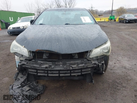 2015 Toyota Camry XLE with VIN 4T1BF1FK1FU087653, listed as a IAAI auction lot 41942940 with 180,274 mi miles. Bid and sale history available at carsss.com. Image 12.