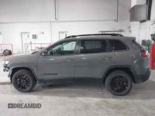 2023 Jeep Cherokee Altitude Lux with VIN 1C4PJMMBXPD115299, listed as a IAAI auction lot 41992492 with 60,232 mi miles. Bid and sale history available at carsss.com. Image 15.