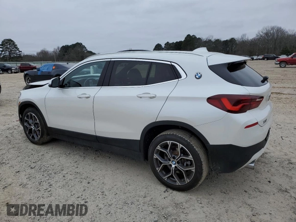 2023 BMW X2 sDrive28i with VIN WBXYH9C07P5V63719, listed as a Copart auction lot 87309194 with 43,124 mi miles and Salvage Title. Bid and sale history available at carsss.com. Image 2.
